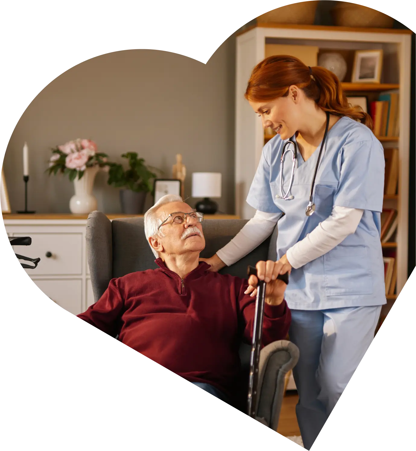 Nurse caring for elderly man at home.